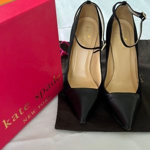 Kate Spade black leather pumps with thin ankle strap.